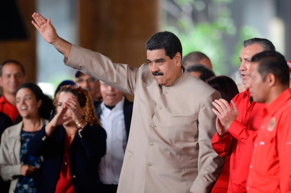  Violence broke out as protesters were blocked from approaching a rally where president Nicolas Maduro addressed supporters