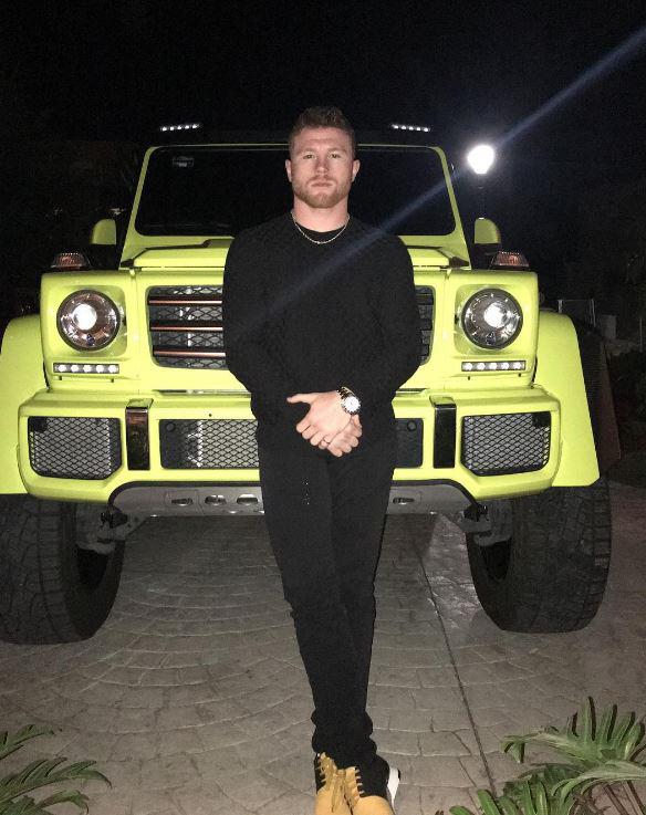  Canelo poses with his £250,000 Mercedes G-Class jeep, one of his fleet of cars