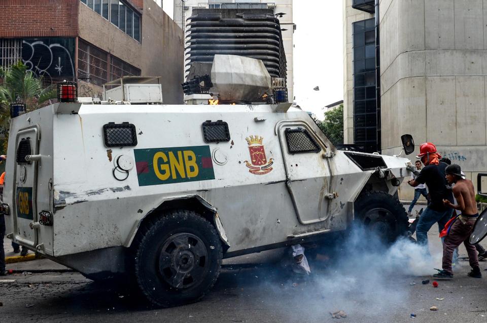  Another protester was injured when he was apparently run over by a police armoured car