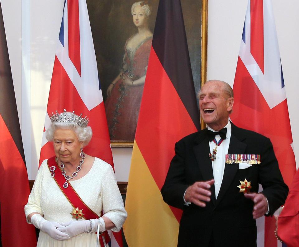  Prince Philip chuckles as he waits to greet guests at a state banquet in Berlin in 2015 alongside The Queen