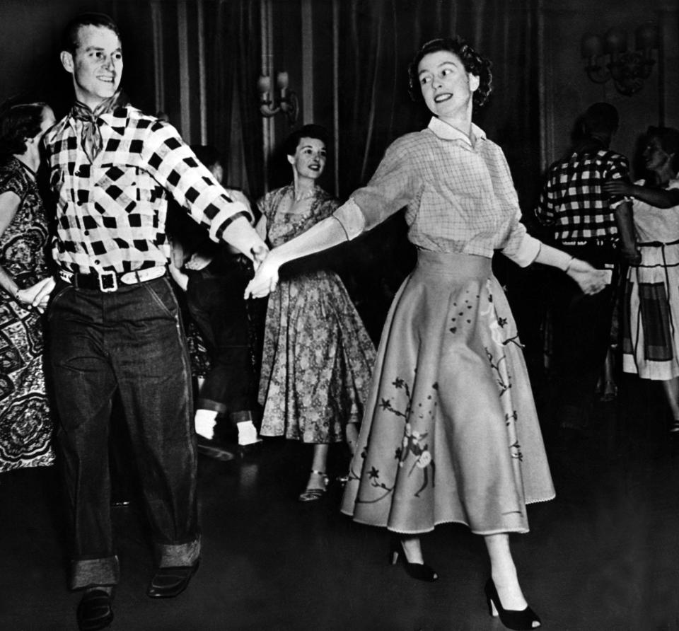  Appropriately-dressed Prince Philip is clearly enjoying a country dance with Princess Elizabeth in Ottawa on their visit to Canada in 1951