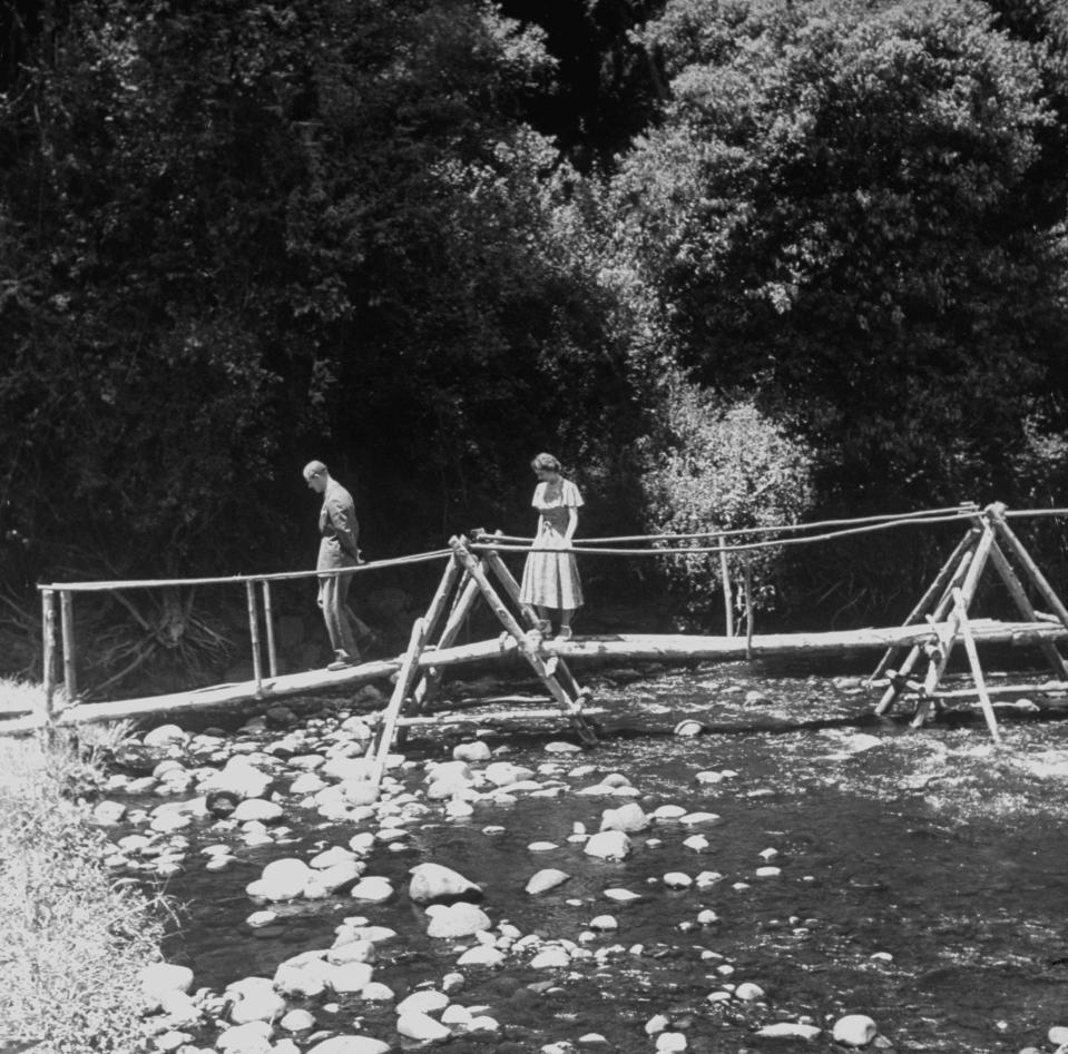  Prince Philip admires the view from a bridge at Sagana Lodge in Kenya on the eve of the death of the Princess's father George VI in 1952