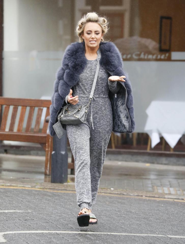  Amber appeared to get caught in the rain as she left salon in Essex