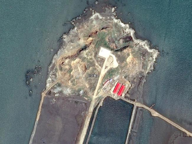  Roads connecting the islands can be seen along with installations and what are thought to be VIP viewing areas