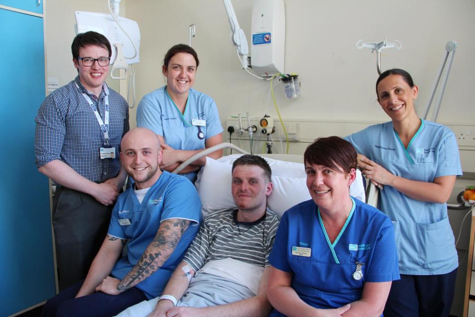  Matthew Bryce surrounded by staff from Ulster Hospital, in Belfast