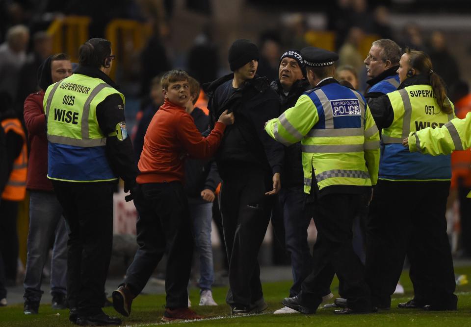  Police intervened following the 0-0 draw at the New Den