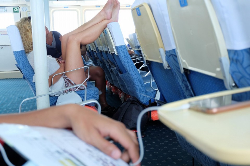 This female traveller was accused of disrespectful behaviour for putting her bare feet on a headrest during a ferry ride 