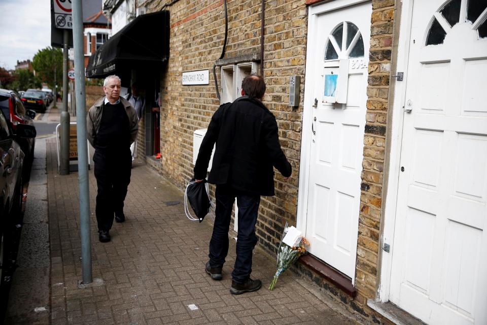  A bunch of flowers appears outside the home of Billy Yates - where he was found hanged last week