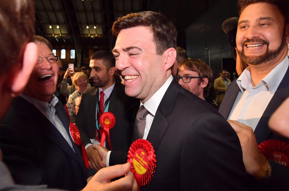  The former Cabinet minister Andy Burnham laughed with supporters after his resounding victory in Manchester