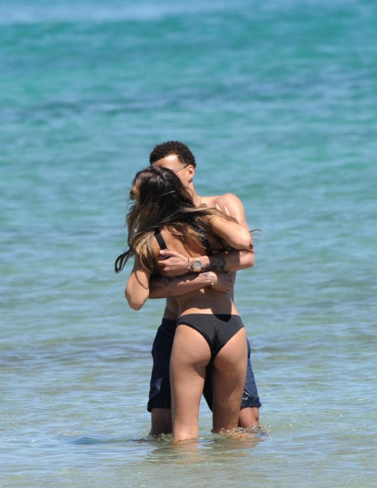  She and Dele Alli got very cosy as they embraced in the water