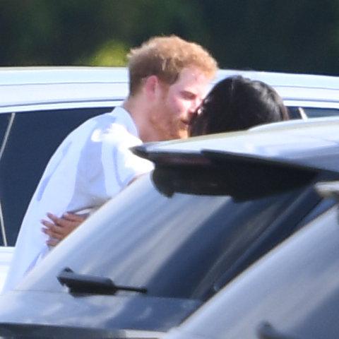  The embrace seemed to do Harry a world of good, as he went on to win the game with brother Prince William