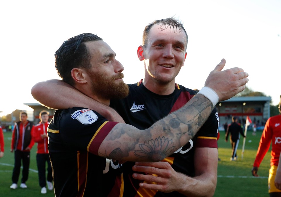 Romain Vincelot and Charlie Wyke of Bradford celebrate at the full-time whistle