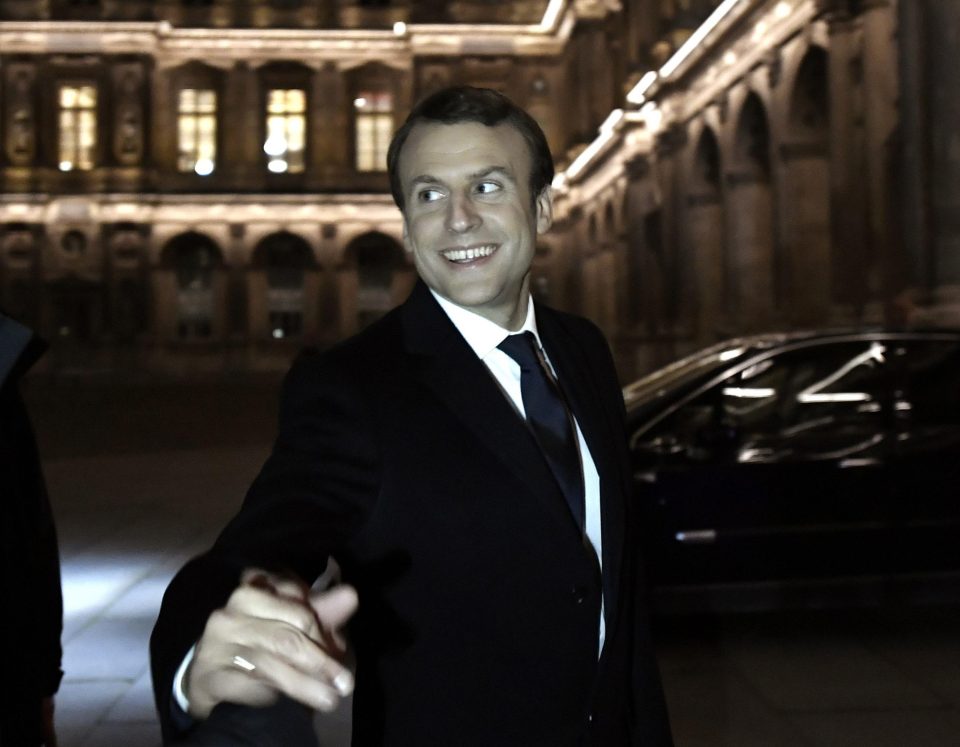  French President Emmanuel Macron leaves the Louvre Museum after attending the party