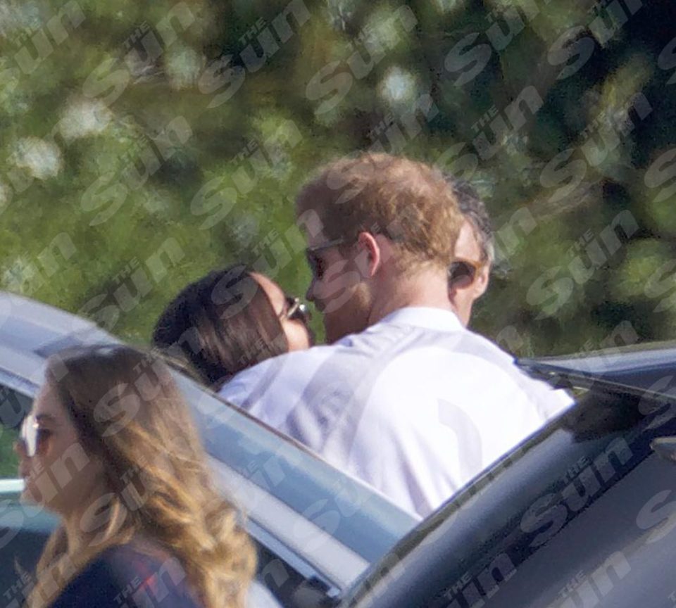  Passionate embrace ... Meghan Markle locked lips with her boyfriend Prince Harry at the posh polo event over the weekend