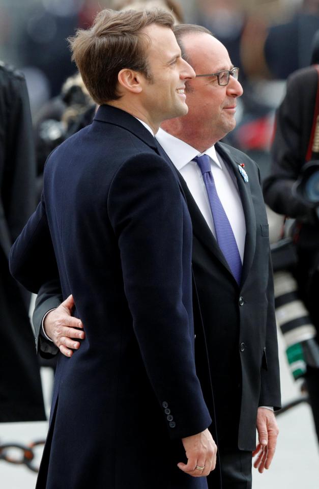  Close pals ...French President-elect Emmanuel Macron, left, and outgoing President Francois Hollande yesterday