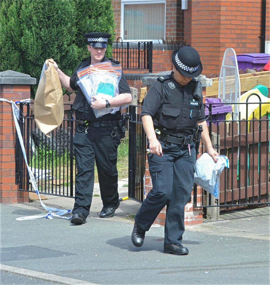  Officers were seen removing evidence bags from the scene on Monday