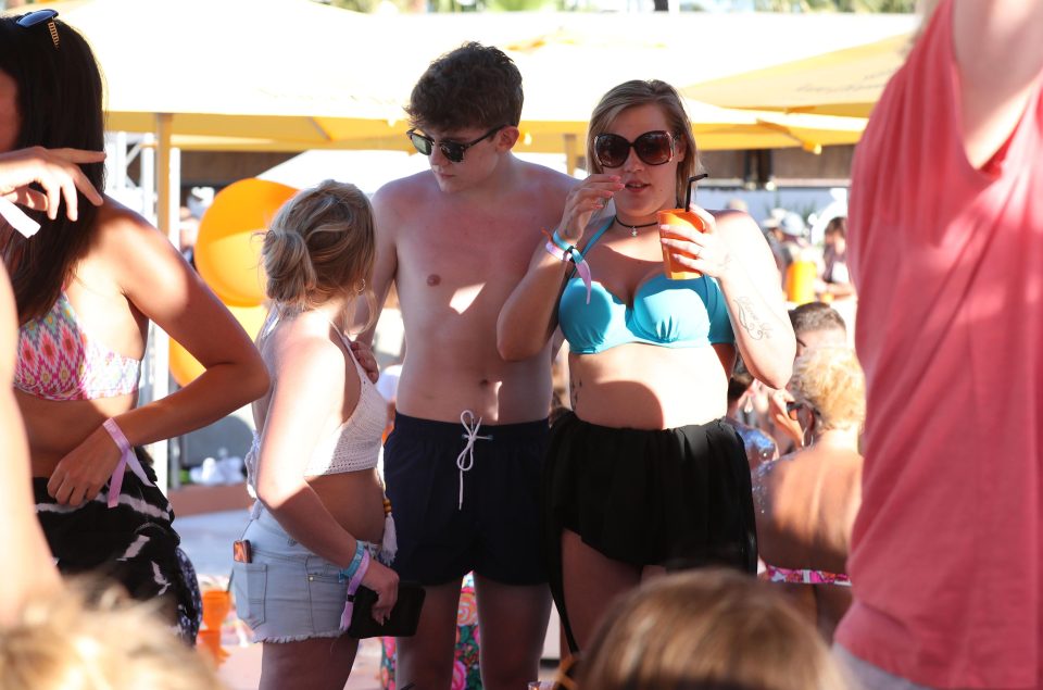  Ellis posed with fans on the beach club in Ibiza