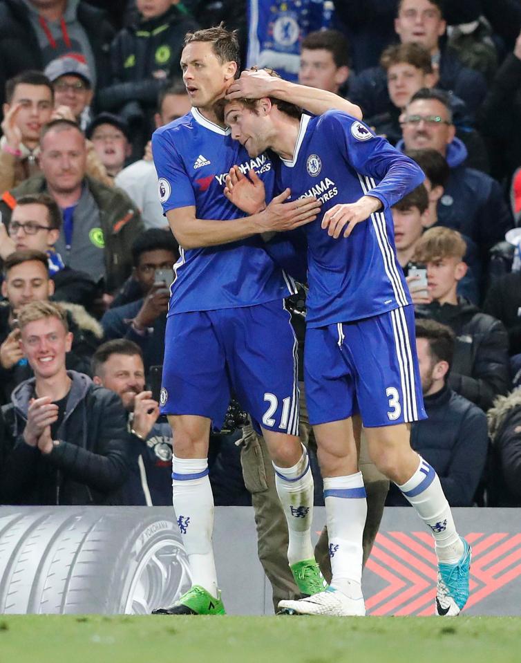  Goalscorer Marcos Alonso is congratulated on his goal by Nemanja Matic