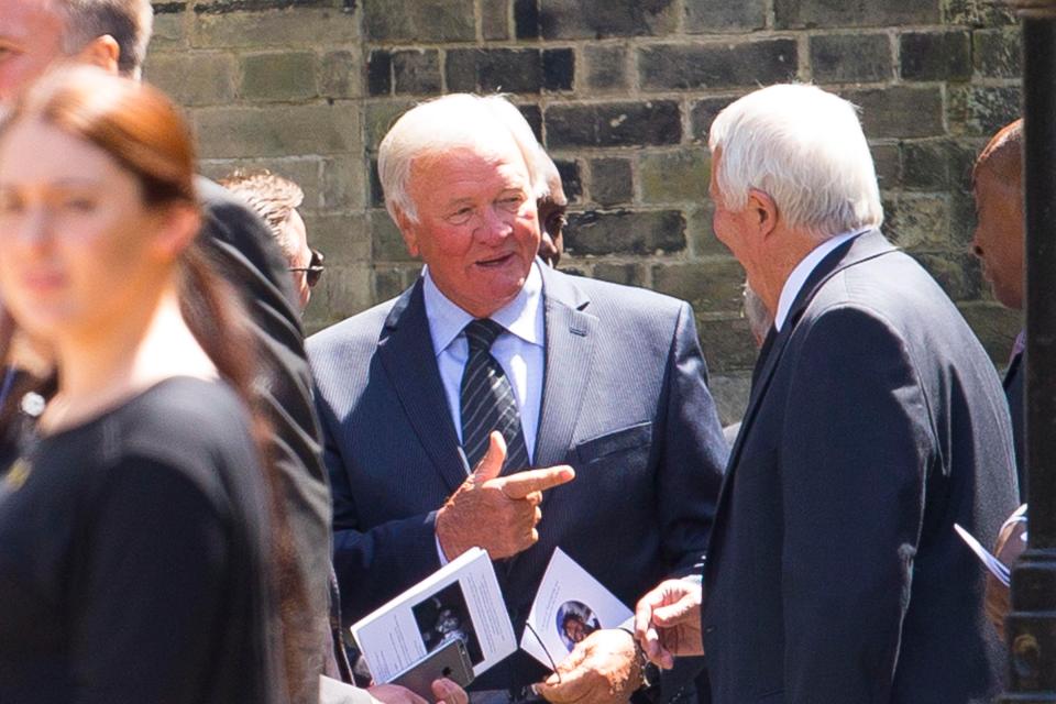  Ron Atkinson, who managed both Manchester United and Aston Villa during his post-playing career, chats to old pals outside the church