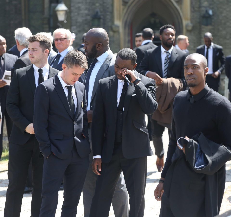  Former England ace Andy Cole wipes away tears outside the funeral of Ugo today