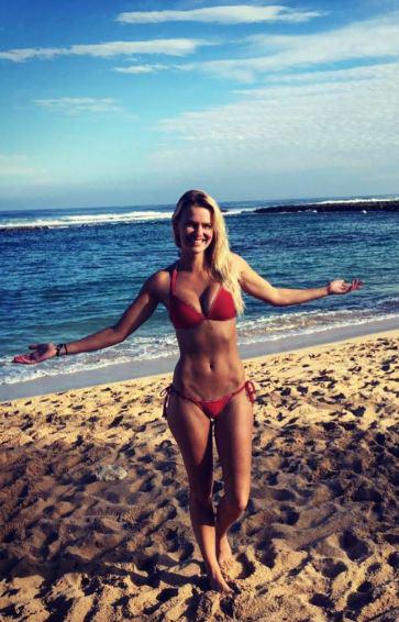  Beach babe Jade stuns in a red bikini