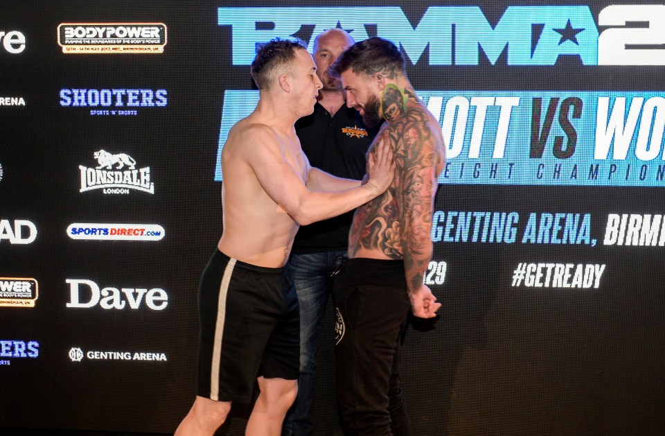 Aaron Chalmers and Greg Jenkins get a bit too close for comfort as they eye each other up