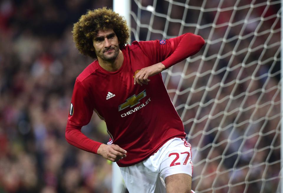  Marouane Fellaini celebrates another important Manchester United goal