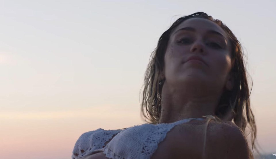 In some scenes Miley could be seen watching the sun go down on a beach