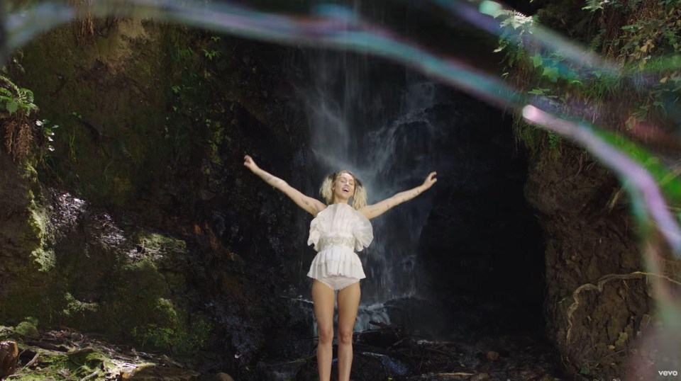 She was also beamed to a waterfall where she allowed the water to take over her body