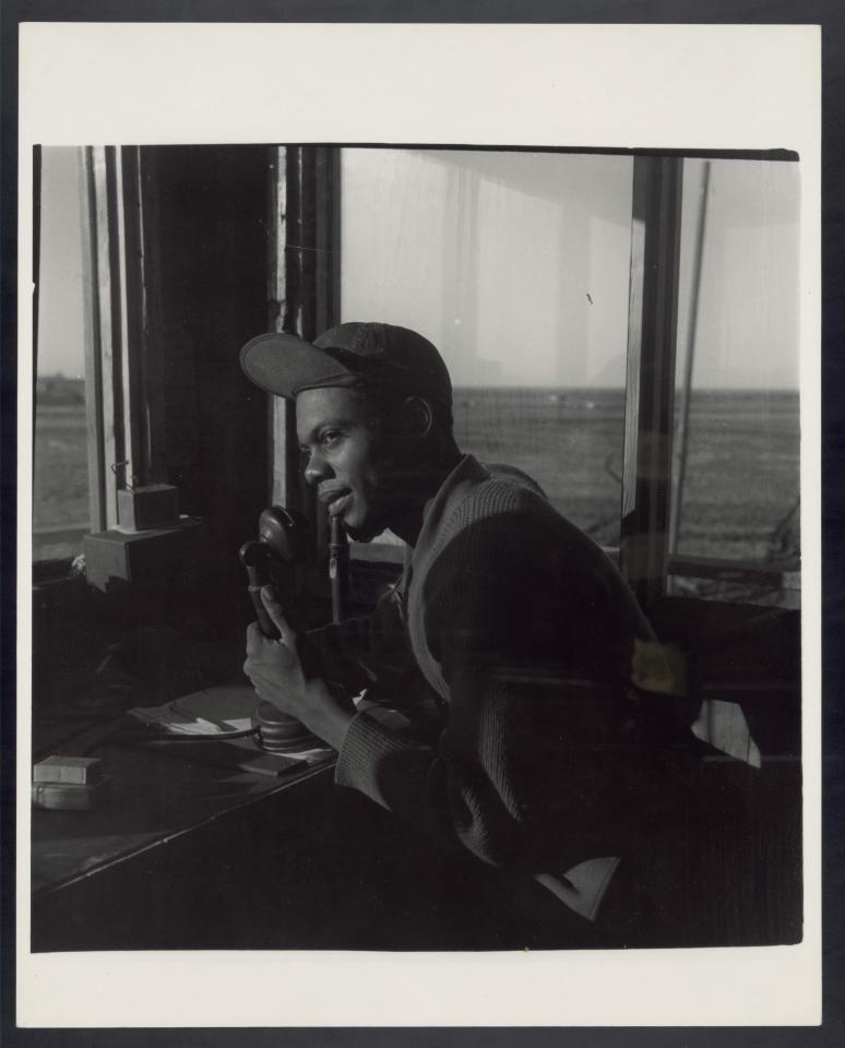  Sgt. William P. Bostic in a control tower, March 1945