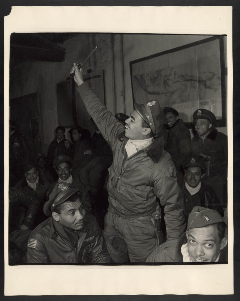  Members of the 332nd in a briefing room. They flew vital missions for the US air force during World War Two