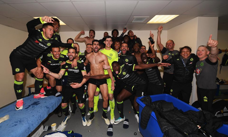  Chelsea players celebrate in the dressing room after their title win