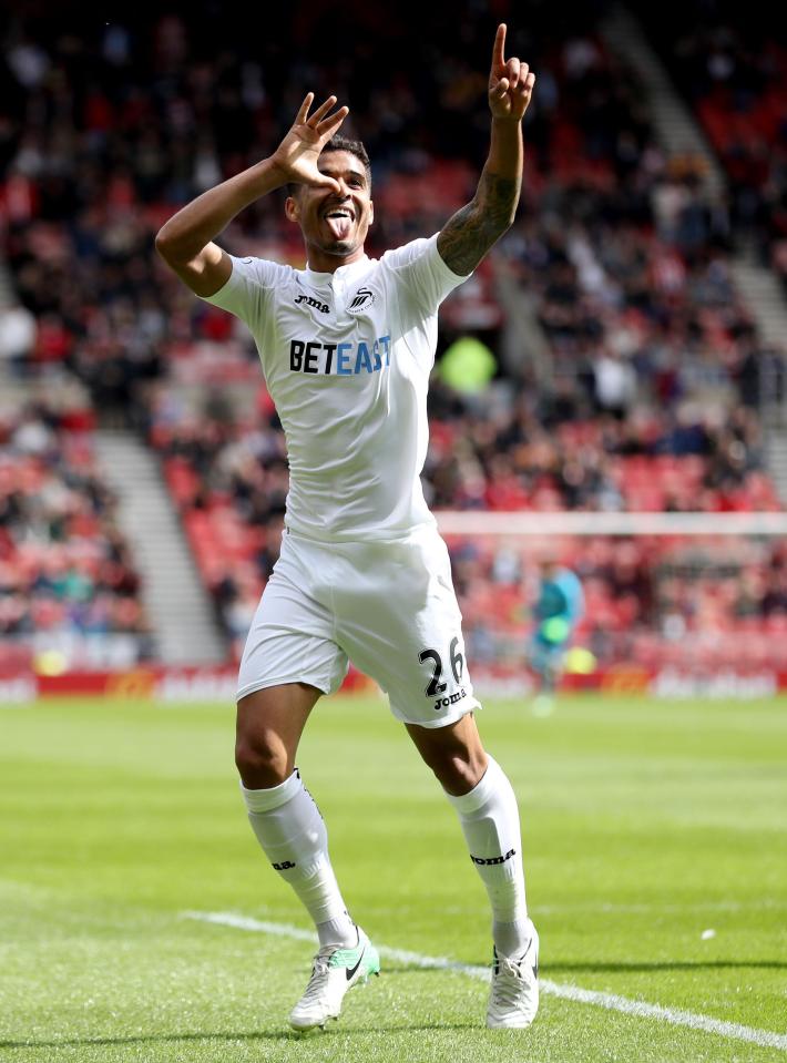  Kyle Naughton celebrates his goal deep in first hald stoppage time