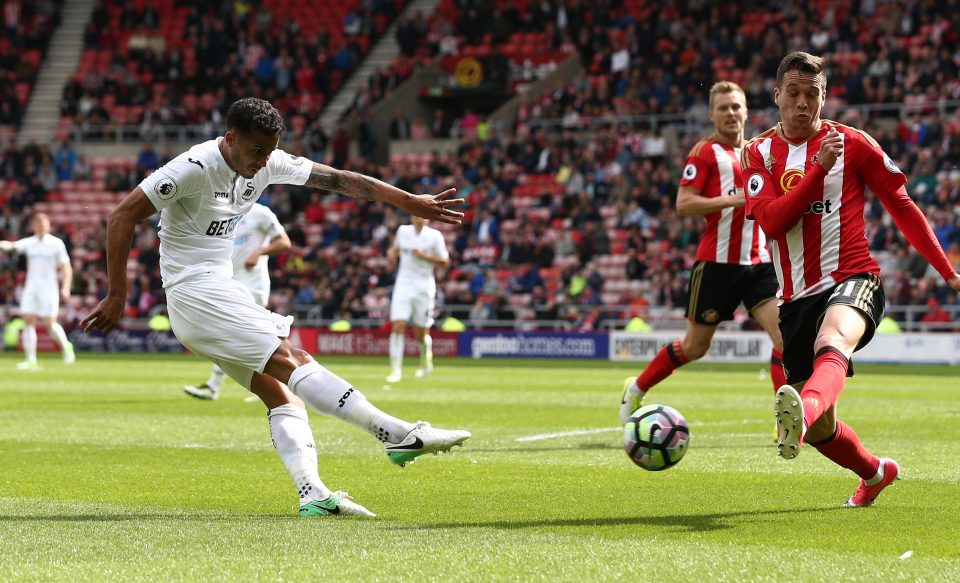  Kyle Naughton strikes his fierce drive into the top corner to put Swansea two-up