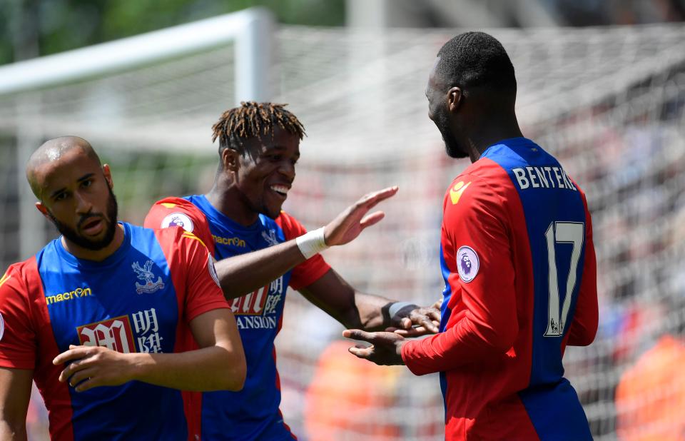  The winger celebrates with Christian Benteke on the weekend, and could be set to join him as one of the highest paid players at Crystal Palace