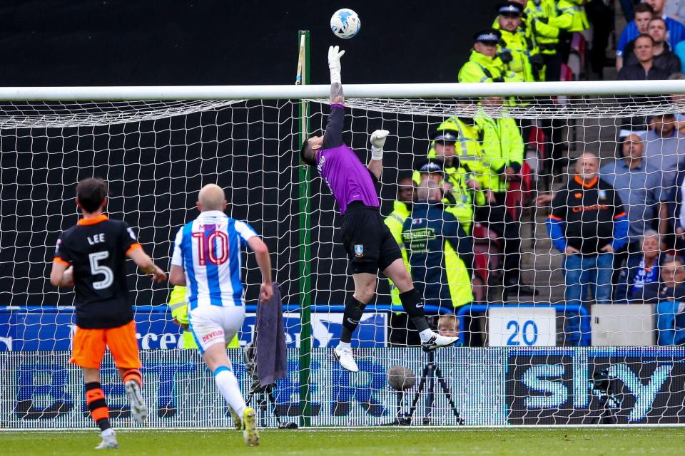  Sheffield Wednesday goalkeeper Keiren Westwood tips an effort over the bar