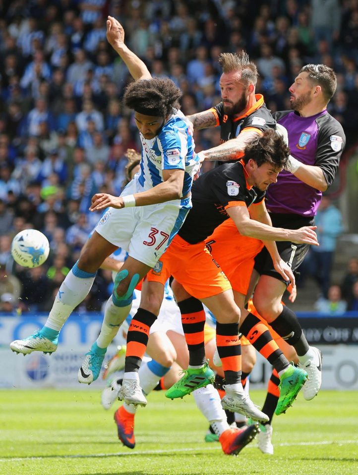  Huddersfield's Izzy Brown came closest for the Terriers as he struck the woodwork