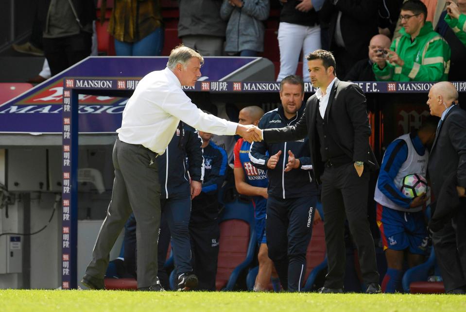  Sam Allardyce and Marco Silva shake hands at the end of the Selhurt Park match