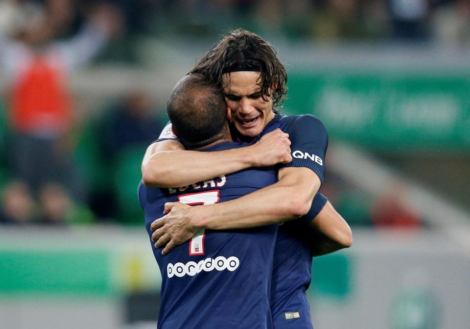  Edinson Cavani celebrates after he opened the scoring early on for Paris Saint-Germain with a clinical header