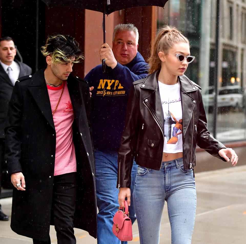  Zayn Malik showed off his streaky new green hairstyle as he stepped out with Gigi in New York City