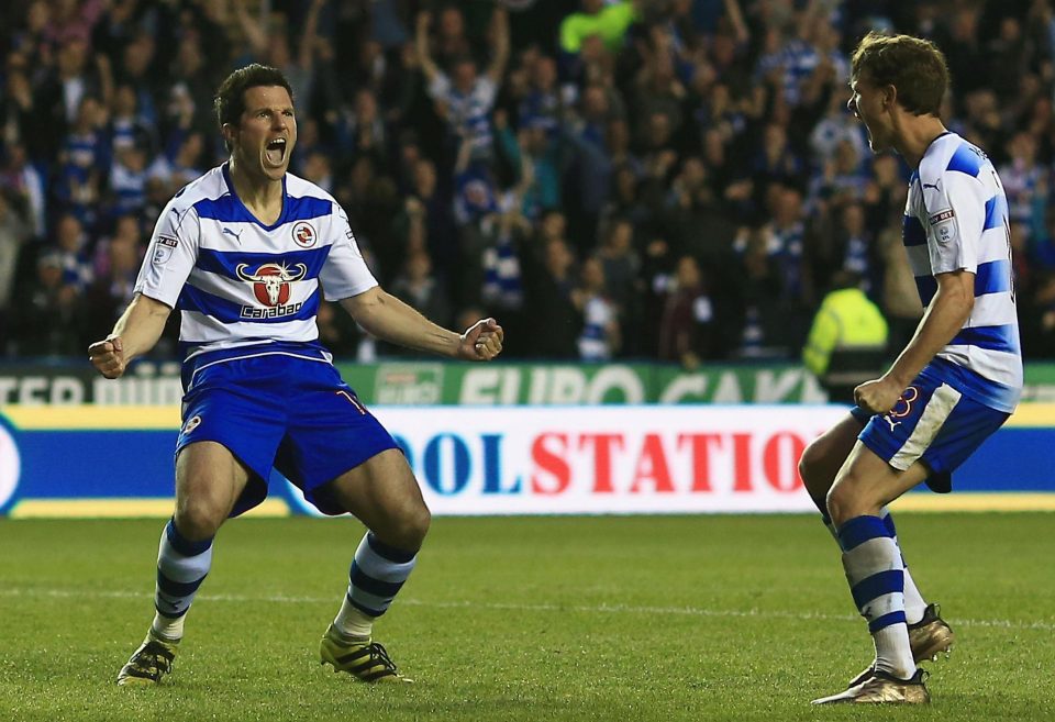  Yann Kermorgant celebrates after netting the only goal of the game to send Reading to Wembley