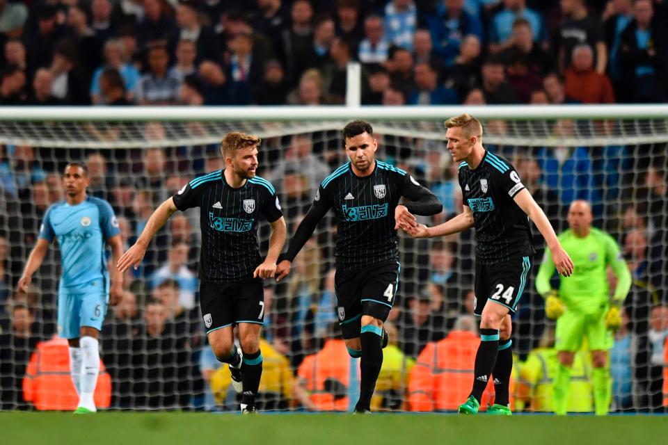  Hal Robson-Kanu celebrates his late consolation goal