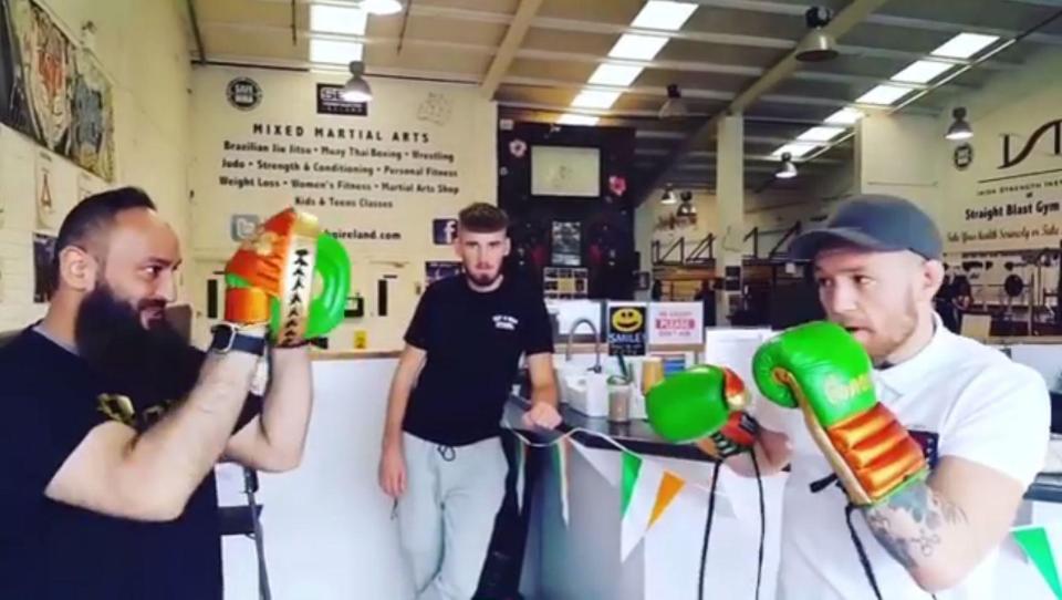  Conor McGregor then shows of his fast boxing skills, with his new gloves and pads