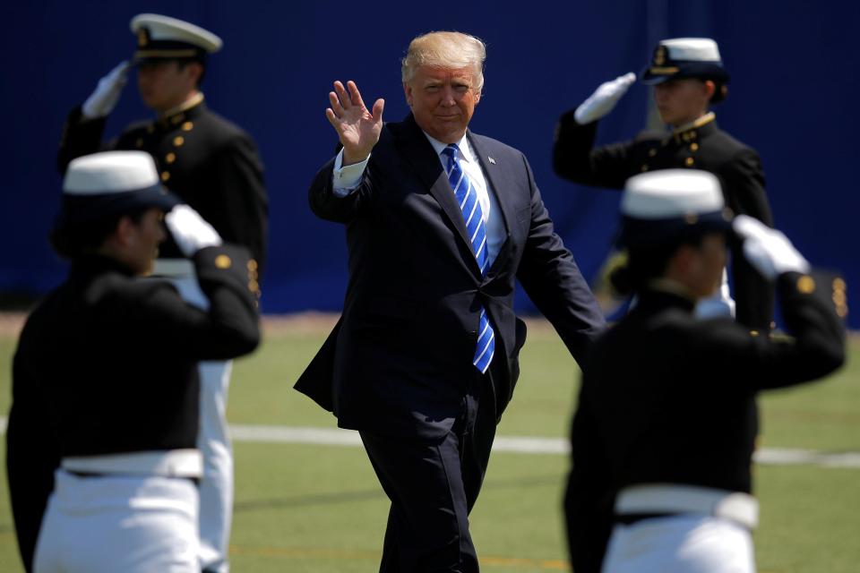  The President is saluted by US Coast Guard cadets at the prestigious ceremony