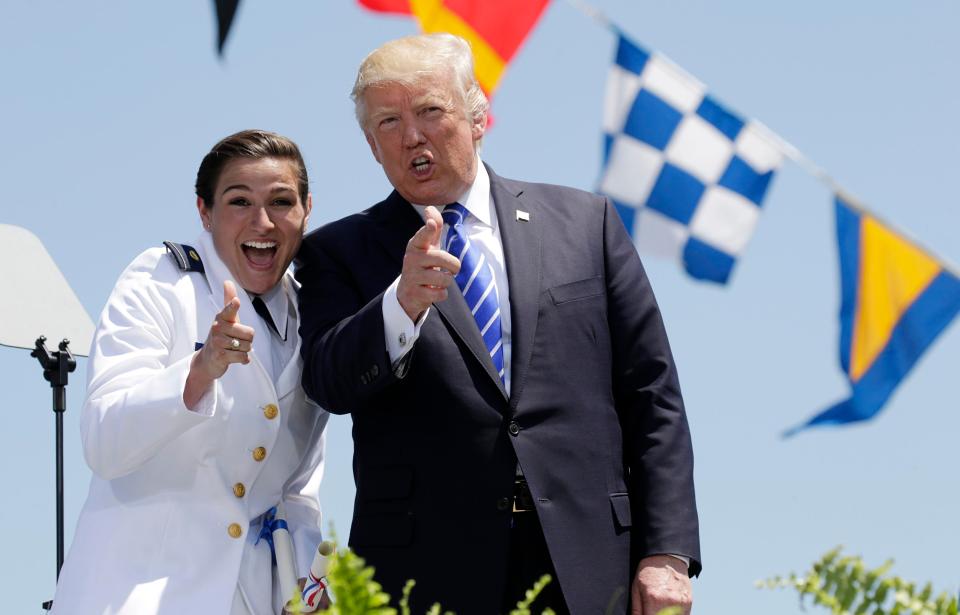  Trump poses with graduate Erin Reynolds after she received her US Coast Guard Academy diploma