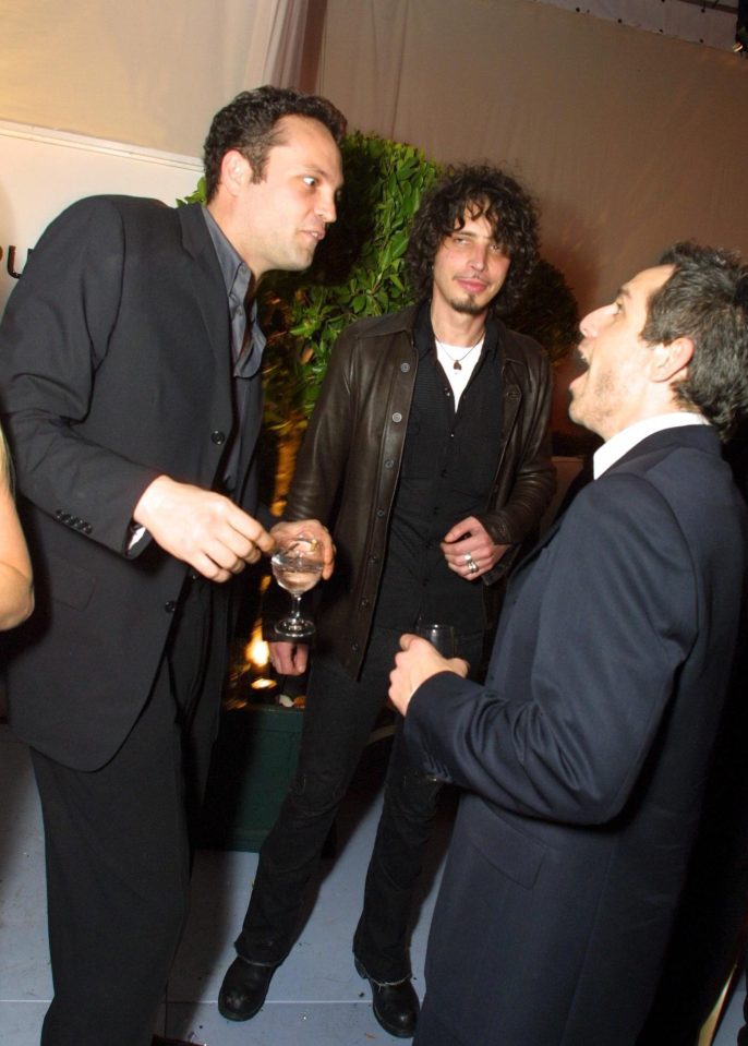  Cornell, centre, with actors Vince Vaughan and Ben Stiller at an Oscar party in 2001