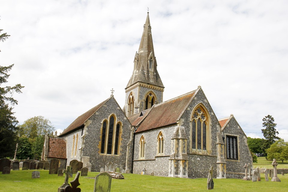 A peak inside the church shows Gothic stained glass windows and a stunning embellished alter