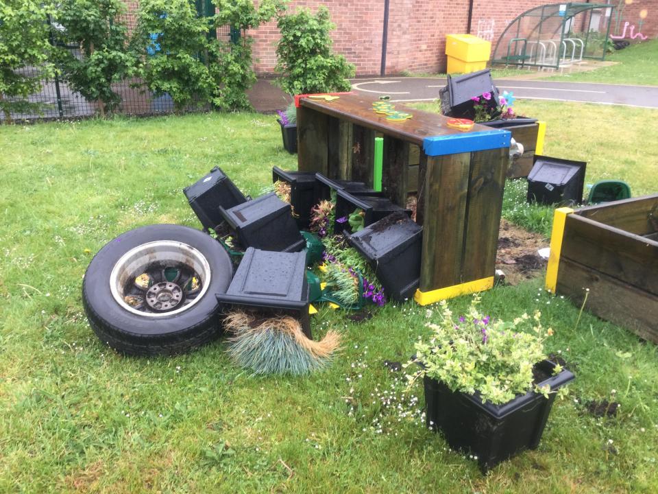  Some of the damage left by vandals who tore up the memorial garden