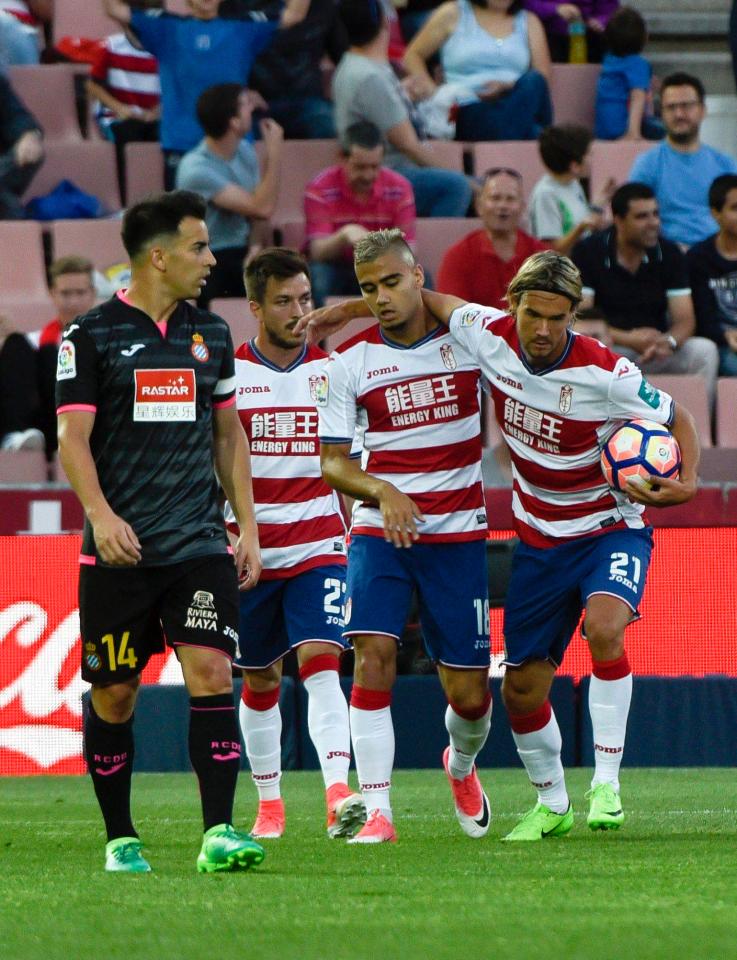  Manchester United loanee Andreas Pereira (centre) scores a consolation goal for Granada