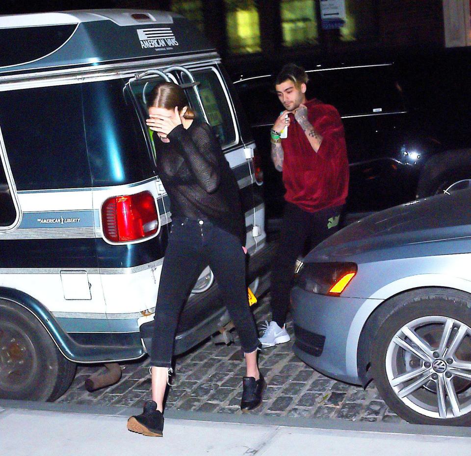  Gigi led the way past cameras on the date night